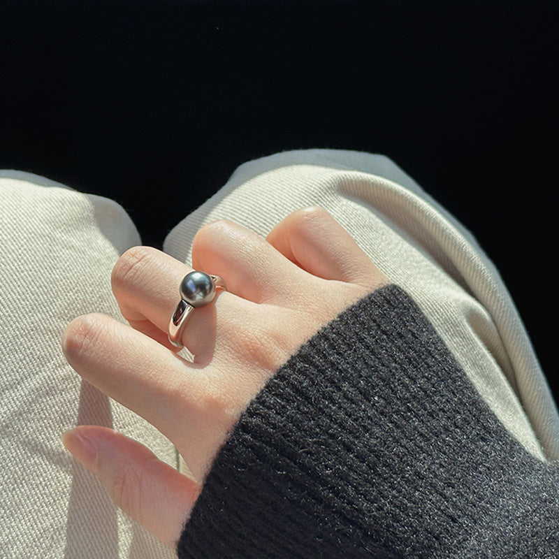 Glossy metal pearl ring