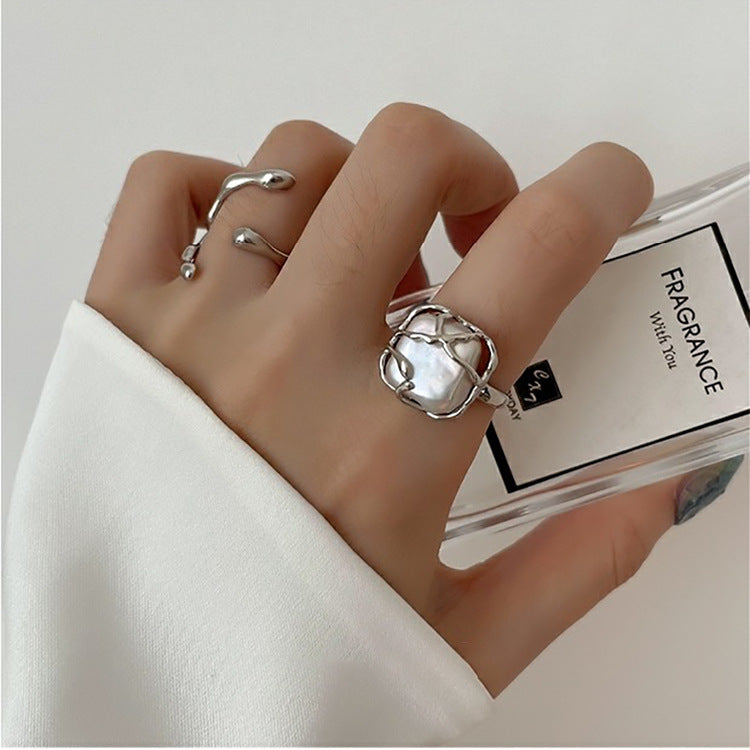 Irregular metal pearl opening rings