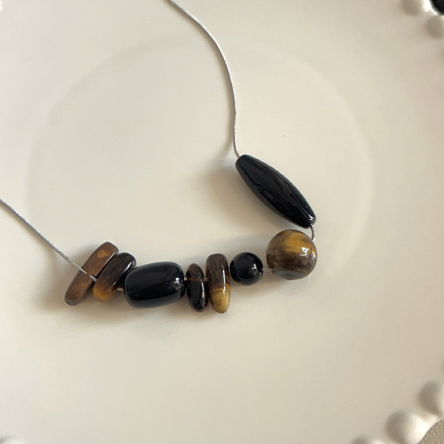 Unique irregular stone stitched string necklace